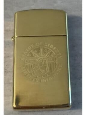 Zippo Statue of Liberty Island Slim Lighter Gold Brass Unused  XIV Bradford PA